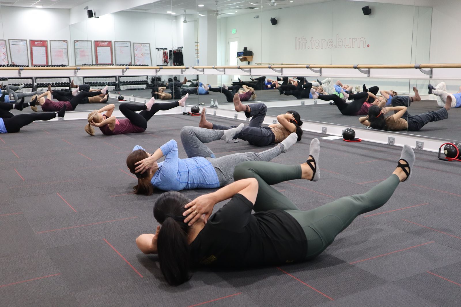 Members mid-circuit in a Pulse conditioning class
