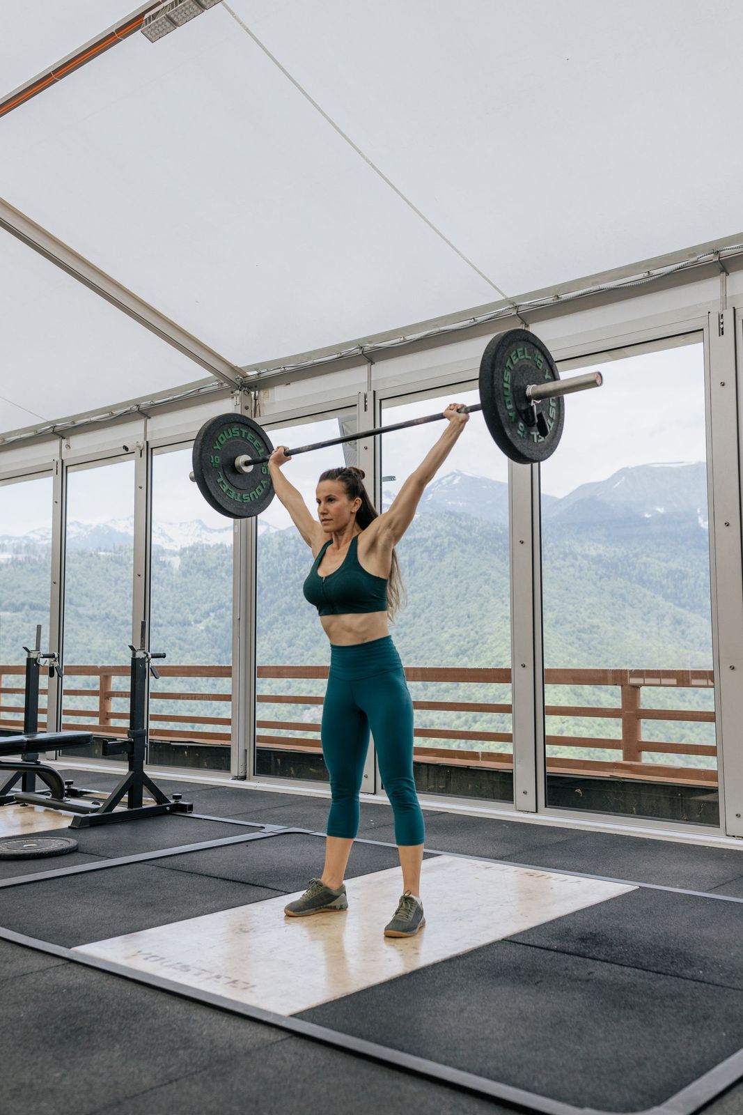 A Pulse member finishing a set on the strength floor as the morning session begins