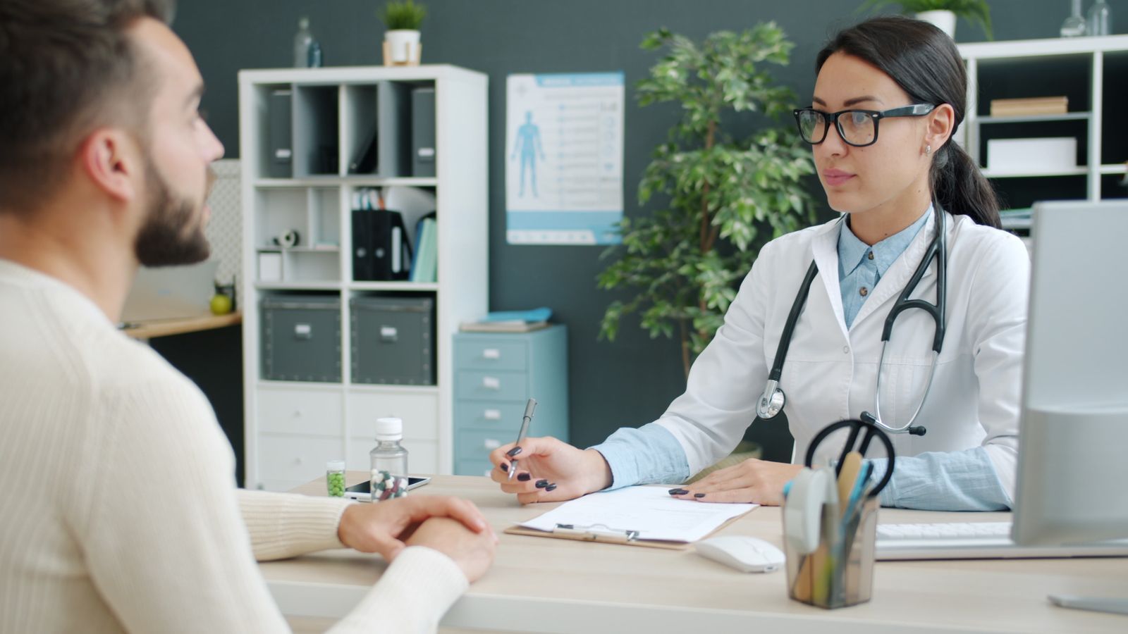 A Clearview GP talking a patient through their results in a consulting room