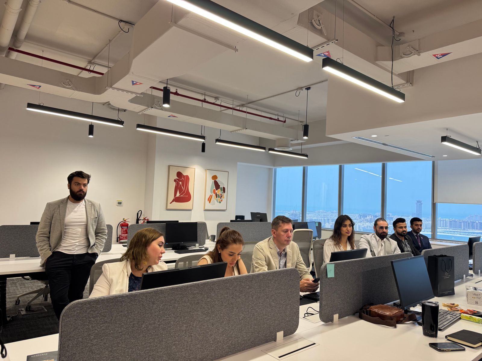 Crestwell partners and clients working through a set of accounts in the Queen Square meeting room