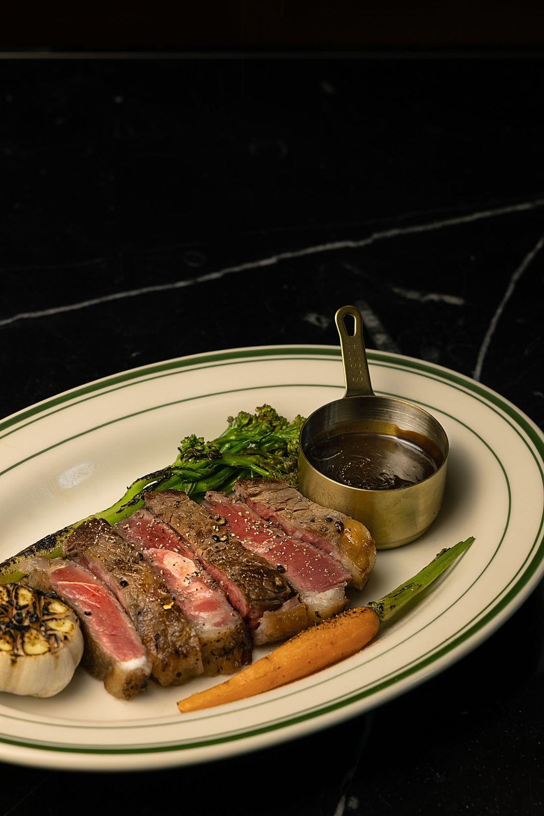 Dry-aged rib of beef cooked over oak