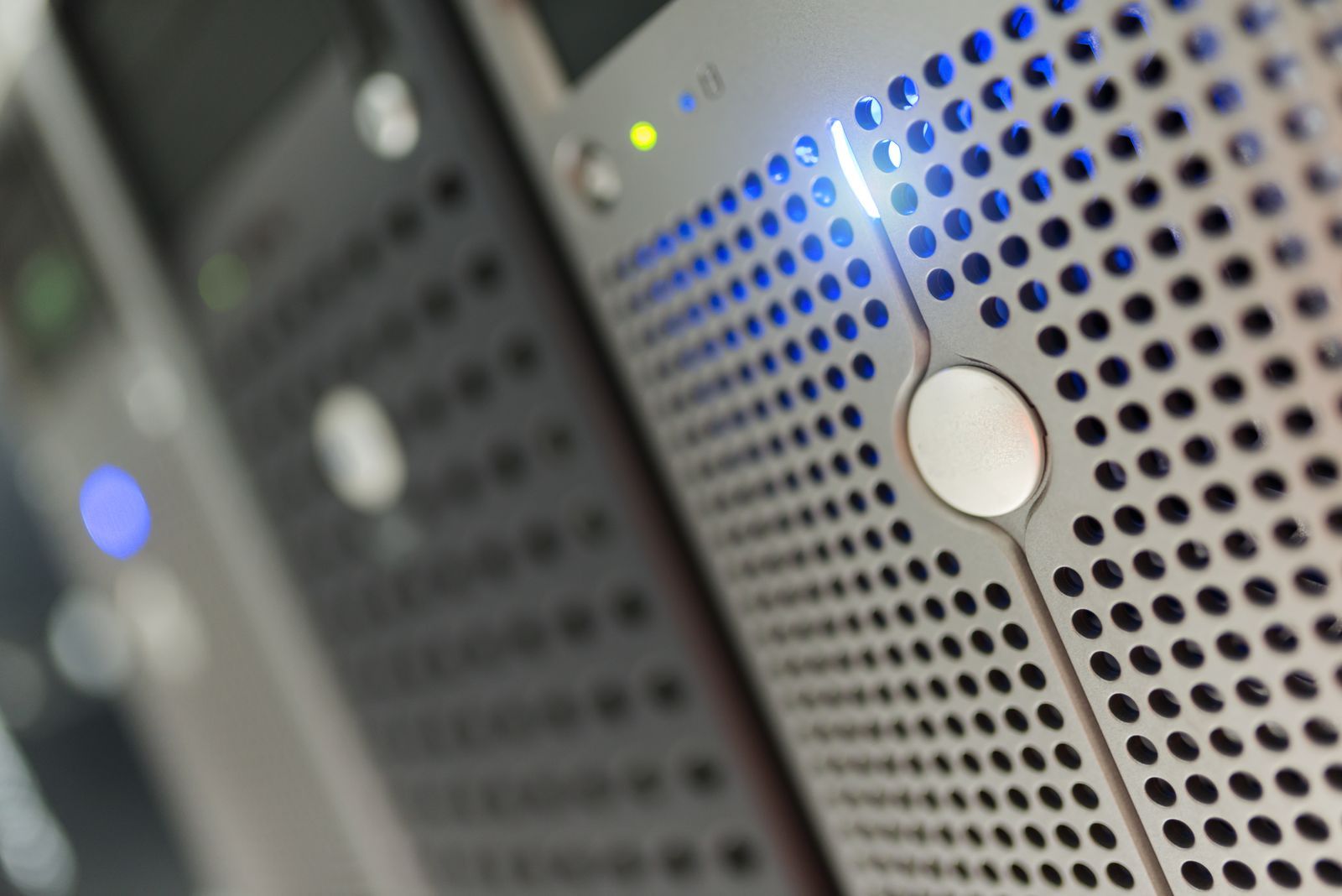 Rows of illuminated server cabinets in the Nexis data centre partner facility